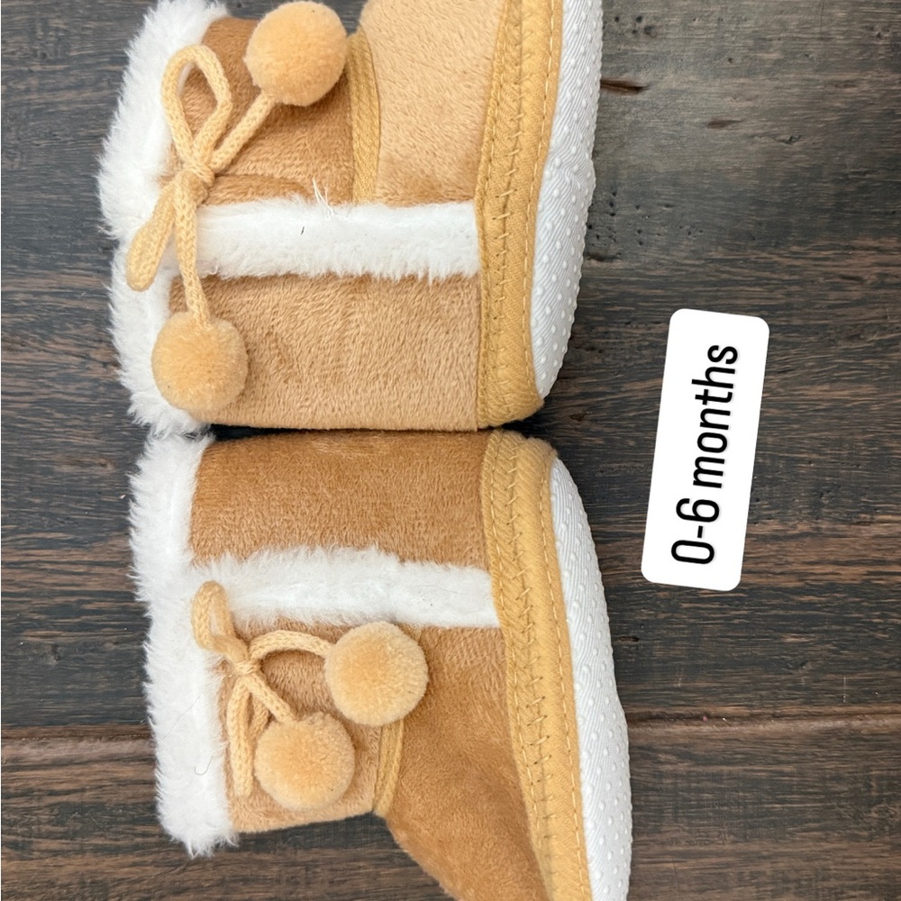 Cozy Tan Baby Booties with Pom Poms